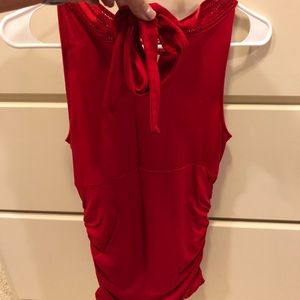 Red sleeveless shirt